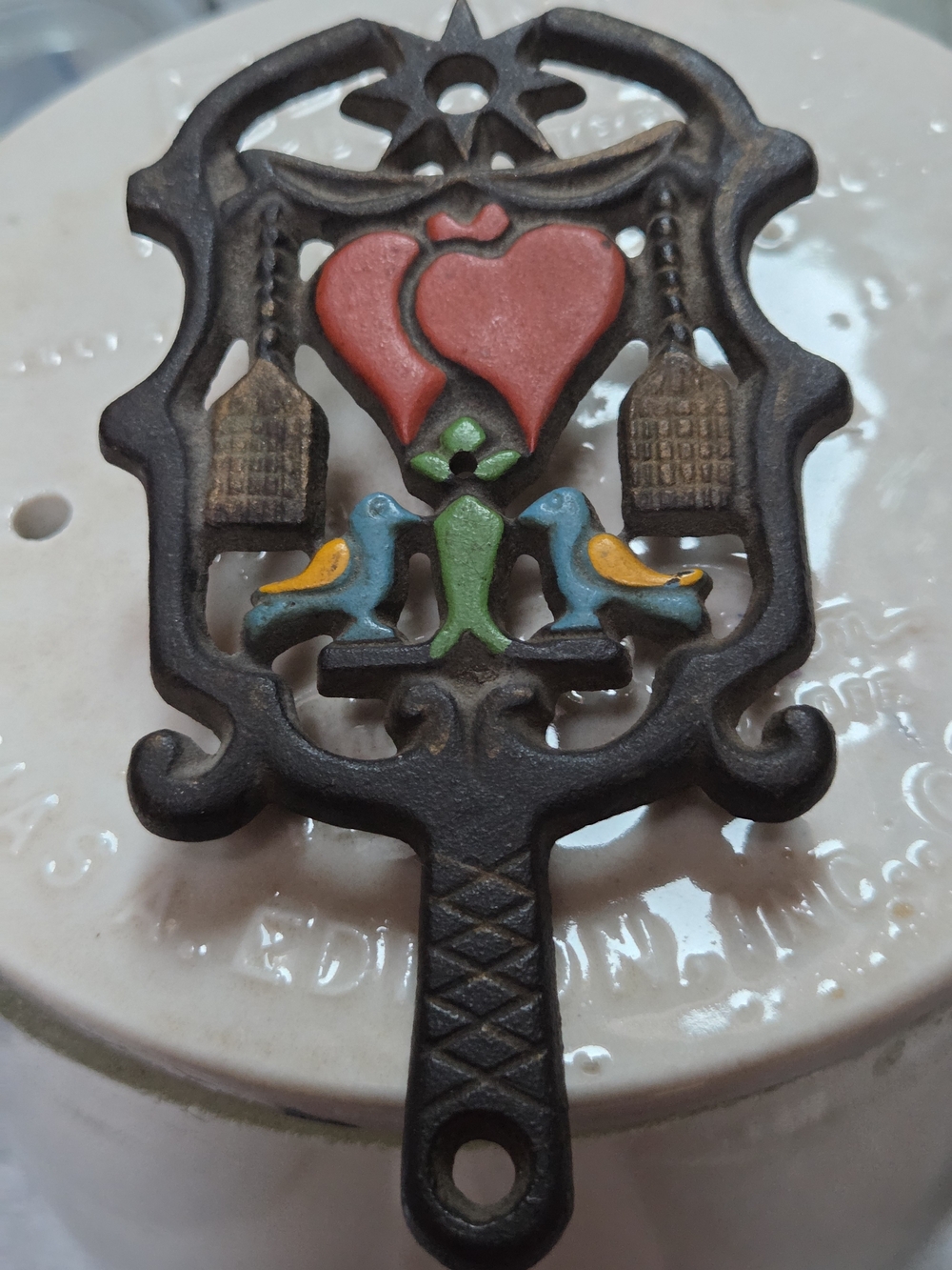 Vintage Wilton Black Cast Iron Small Trivet w/ Painted Brooms, Hearts & Birds